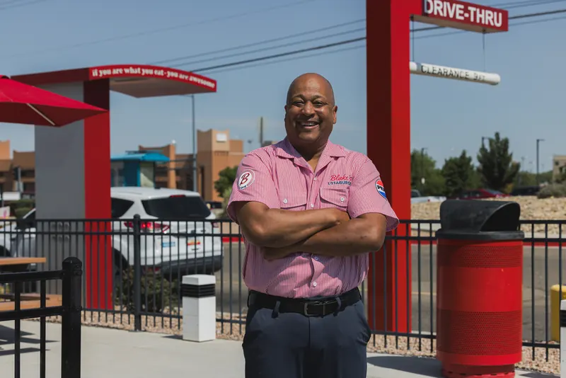 Blake’s Lotaburger: Arms crossed at the drive-thru